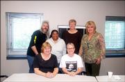 Patrick Jones, young adult librarian and author, back row left, visited Lawrence High School and the Douglas County Juvenile Detention Center in October to talk about his new book, "Things Change." Pictured are, back row from left, Jones; Kim Patton, Lawrence Public Library young adult librarian; Pam Weigand, director of the Douglas County Youth Juvenile Detention/Youth Services; and Diane Spicer, day school teacher; front row from left, Marty Gunn, day school facilitator; and Arla Jones, Lawrence High School librarian.
