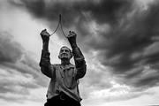 This photo provided by Jim Richardson, showing Ralph Fraser near Belleville with his water witcher, was one of the first images that inspired Richardson to begin photographing his native state in depth. This photograph is included in his show, "Vintage Kansas," which is hanging at Small World gallery in Lindsborg.