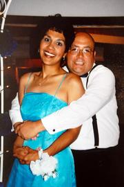 Before: This submitted wedding photo shows Sgt. James Anguiano, with the KU Public Safety Office, before he lost 75 pounds in a diet program that he has participated in with other officers on the force. Anguiano's wife, Linda, is on his left.