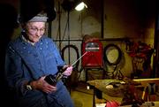 Thelma Baldock, 85, of Delphos, readies her welding equipment Nov. 9. Baldock moved to Portland, Ore., during World War II to work as a welder in St. John's Shipyard.