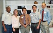 From left are Tony Blancas, Lindsay Ferrell, Clint Bradley, Rob Gillespie and Steve Lane. They volunteered to help during the United Way Small Business Phon-a-thon on Oct. 13. The volunteers visited with small businesses in the Lawrence area to encourage contributions to the United Way campaign.