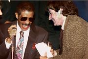 Comedians Richard Pryor, left, and Robin Williams laugh at the New York Friar's club in this September 1991 file photo. Pryor, the caustic yet perceptive actor-comedian, died Saturday of a heart attack. He was 65.