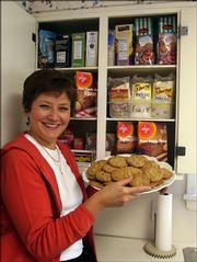 Katherine Navarre displays a plate of gluten-free, chocolate-chip cookies at her home in Toledo, Ohio. Her two daughters have celiac disease and cannot have foods with gluten or wheat.