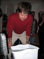 Another of Donovan's feats of strength requires guests to see who can hold their head under ice water the longest.
