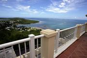 A balcony at the El Conquistador Resort in Fajardo, Puerto Rico, has an expansive ocean view, as seen in this Aug. 30, 2005, file photo. Rep. Tom DeLay, R-Texas, has visited many high-end resorts around the U.S. and abroad, all in the name of raising money for the Republican party.