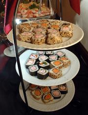 Sushi is an easy finger food to serve at parties; Maceli's Catering, 1031 N.H., offers it along with other hors d' oeuvres.