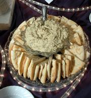 Hummus and pita wedges offer a simple recipe for easy entertainment over the holidays. These appetizers were prepared for a recent party by Maceli's, a catering business at 1031 N.H.