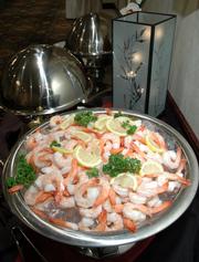 Shrimp with cocktail sauce is a quick classic that can cut down on kitchen time so you can spend more quality time with your party guests.