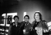 Enjoying the reception after the 10th annual Phoenix Awards on Nov. 6 are past and present Lawrence Arts Commissioners, from left: Sandra Wiechert, chairwoman this year for the Phoenix awards; DiAnne Damro, immediate past chairwoman of the Lawrence Arts Commission; and Marlene Merrill, chairwoman of the Lawrence Arts Commission.