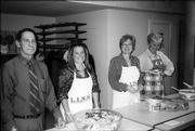 From left, Bill Winkler, Wendy Leedy, Deb Waggoner and Penny McDonald, of the Lawrence Kiwanis Club, get ready to serve salads at the Lawrence Interdenominational Nutrition Kitchen at First Christian Church. It is an annual tradition for the club to provide food and serve the meal at LINK on the Tuesday before Thanksgiving.