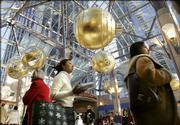 The Prudential Center in Boston is filled Friday with last-minute holiday shoppers. Retailers are hoping for big sales today as procrastinators hit the stores.