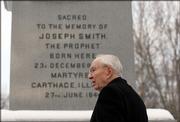 Gordon B. Hinckley, president of The Church of Jesus Christ of Latter-day Saints, stands Thursday at the memorial obelisk on the grounds of the Joseph Smith Birthplace Memorial in Sharon, Vt. Hinckley spoke about the life and legacy of founder Joseph Smith on Thursday, a day before Mormons marked the bicentennial of Smith's birth.