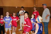 Players box out under the basket for the rebound Nov. 4 at the East Lawrence Center. The Unified League provides kids an opportunity to socialize while learning basketball fundamentals.