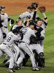 Jubilant White Sox celebrate after beating the Houston Astros, 1-0, to win the World Series in this file photo from Oct. 26. Chicago's first World Series since 1917 was voted Monday as the sports story of the year in balloting by newspaper and broadcast members of the Associated Press.