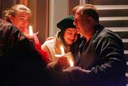 A candlelight memorial service Wednesday honored the 12 miners who died in a mine explosion in Tallmansville, W.Va. The miners had been trapped 260 feet down since Monday morning in the Sago Mine.