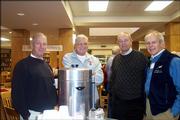 From left, Steve Sublett, Max Rife, Darrell Falen and Stan Roth attend the annual luncheon for retired faculty and staff of Lawrence High School. The event was Dec. 7 in the school's library.