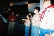 Baldwin Boy Scout Troop 65 members, from left, James Simmons, Andrew Morgan, Brandon Baltzell and Thomas Bollig listen to a tour leader talk about the World War II era V2 rocket at the Kansas Cosmosphere in Hutchinson. The scouts visited the center Dec. 10.