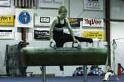 Charlie Arnold performs his pommel horse routine for the judge Saturday at the Winter Cup meet held at Lawrence Gymnastics Academy. Arnold used the home crowd to energize him to place second int he pommel horse, floor exercise, rings, parallel bars and All-Around.
