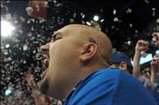 Brandon Perkins, Kansas University senior, cheers during player introductions before last Saturday's men's basketball game against Kentucky in Allen Fieldhouse. KU beat the Wildcats 73-46.