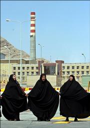 Demonstrators form a human chain at the Isfahan's Uranium Conversion Facility to support Iran's nuclear program in this August file photo. Iran on Friday threatened to end cooperation with the U.N. watchdog agency.