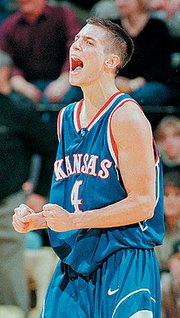 Former Kansas University guard Ryan Robertson lets out a yell after
the Jayhawks defeated Missouri, 73-61, in this file photo from 1999
in Robertson's final trip to Columbia, Mo., as a Jayhawk.