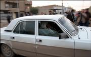 Two of the five women released from a detention center are seen in a vehicle going to their homes in Baghdad, Iraq. As part of a release of 420 detained Iraqis, five Iraqi women were released Thursday, a move demanded by the kidnappers of American reporter Jill Carroll to spare her life. A U.S. official said the release had nothing to do with the demand.