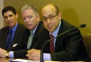 Members of the law team that battled the Dover, Pa., intelligent design case say the same issues loom in Kansas. Speaking on Saturday at the Dole Institute of Politics were, from left, Richard Katskee, Steve Harvey and Eric Rothschild.