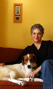 Mary Wharff, photographed with her dog Zoe, won this year's Langston Hughes Creative Writing Award for fiction.