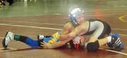 Sunflower wrestler Hunter Haralson has his opponent to the mat at the Tournament of Champions in Salina over the weekend. Haralson won the championship for his age division in what is Kansas' toughest tournament of the season.