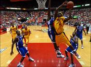 Kansas guard Julian Wright comes in to defend against Iowa State
guard Curtis Stinson in the second half the game on January 28 at
the Hilton Colliseum.