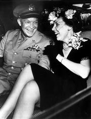 Alone together for the first time since Gen. Dwight D. Eisenhower arrived home from World War II, Eisenhower and his wife, Mamie, go to meet President Truman, in this June 18, 1945, file photo. A new book of letters explores the emotional lives between presidents and their wives.
