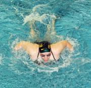 Aquahawk Julia Payton swims the 100 fly and places six in the race Saturday in the MAL West Championships.