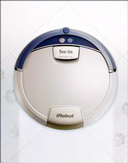 The Roomba Vacuuming Robot cleans carpets and hardwood floors. A flooring sales specialist at The Home Depot in Lawrence says the robot "basically goes around and knocks what&squot;s loose and picks it up, kind of like a dustpan." The Lawrence store has sold between 50 and 100 in the past three years.