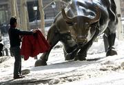 Eduardo Akamine, of Brazil, tours the financial district of New York City. Stocks moved higher Tuesday in heavy trading. The Dow rose 136.07, or 1.25 percent, to 11,028.39, its first foray past 11,000 since Jan. 12.