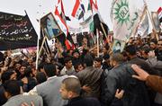 Iraqis rally in protest of British military presence in Basra, Iraq's second-largest city. Authorities in the southern Iraqi province severed all ties with Britain on Tuesday amid the furor of the alleged British military abuse of several Iraqi males two years ago in Amarah.