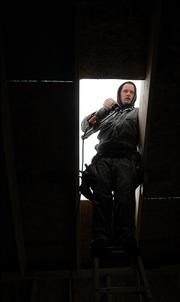 James Ryant, Lawrence, frames a skylight in a house under construction on Legend's Circle by Highland Construction Inc.
Tim Stultz, president of Highland Construction, said heÃs laid off two employees and plans to lay off another two now that city administrators have refused to grant his company a building permit for a 70-unit apartment complex in northwest Lawrence because theyÃre concerned the areaÃs sewer system couldnÃt handle the growth.