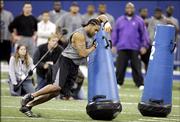 Charlton Keith of Kansas participates in drills during the NFL scouting combine in Indianapolis, Monday, Feb. 27, 2006.