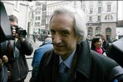 Michael Baigent, co-author of the book 'The Holy Blood and the Holy Grail,' arrives at the Royal Courts of Justice in London for a legal case taken out against author Dan Brown, author of the book 'The Da Vinci Code', Monday Feb. 27, 2006. Lawyers acting for the two authors of 'The Holy Blood and the Holy Grail,' a nonfiction title that suggested Jesus fathered children and didn't die during the Crucifixion, claim writer Dan Brown of 'The Da Vinci Code' stole their carefully researched arguments to weave into his fictional best-seller narrative. The writers' civil action against publisher Random House, said their book is one of at least 10 source texts Brown consulted, but said he had a "heavy reliance" on their work.