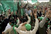 Palestinian Hamas supporters shout slogans as they participate at the campaign rally for the students' council elections at the Arab American university in the northern West Bank town of Jenin Monday Feb. 27, 2006. The elections are scheduled for Tuesday. The European Union agreed Monday to provide euro120 million (US$143 million) in urgent aid for Palestinians before the Hamas led government takes office, a group the bloc considers a terrorist organization.
