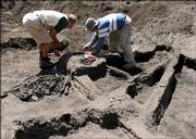 This August, 2004 photo provided the University of Rhode Island shows Professor Haraldur Sigurdsson, a volcanologist at the University of Rhode Island, left, and Igan Sutawidjaja of the directorate of vulcanology in Indonesia, as they work at an excavation site north of the crater at Mount Tambora in Indonesia. Scientists have found what they believe are traces from the lost Indonesian civilization of Tambora, which was wiped out in 1815 by the largest volcanic eruption in recorded history.