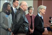 From left Rep. Barbara Ballard, Paul Davis, KU Chancellor Robert Hemenway, Sen. Marci Francisco and Gov. Kathleen Sebelius report on their fly-over of the Lawrence area to assess the damage from Sunday's storm. The Gov. made the trip Monday.