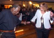 Odell Reed, of the group King Midas and the Muflers, Hutchinson, and Tina Odell, Tulsa, Okla., dance to the music of Fundada during the Kansas Music Hall of Fame ceremony. The Saturday night event honoring musical groups from across the state was at Liberty Hall, 642 Mass.
