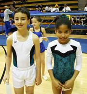 Akram Laytimi and Nicole Vanahill smile for the camera at the Spring to the Summit meet on March 18.