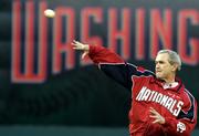 President Bush throws out the first pitch prior to the Washington Nationals home opener in this April 14, 2005 file photo. The White House has not said whether Bush would do the honors this year at the Nationals' home opener April 11.