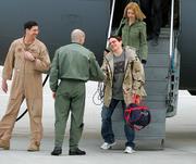 U.S. journalist Jill Carroll, right, leaves a C17 Globemaster and is welcomed by Base Commander Col. Kurt Lohide after she landed Saturday at the U.S. Airbase in Ramstein, Germany, Saturday. Carroll was a hostage in Iraq for 82 days and was released Thursday.