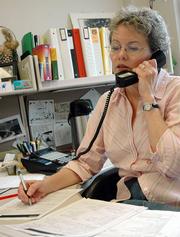 Kathy Colson, RN, with the Douglas County Health Department makes calls to investigate the recent outbreak of mumps in Lawrence. By contacting people who have gotten the mumps Colson and other RN's are trying to connect the links and learn more about the increase in mumps.