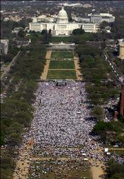 Supporters for immigration rights gather for a rally on the National Mall, Monday, April 10, 2006 in Washington. Hundreds of thousands of people, demanding U.S. citizenship for illegal immigrants, took to the streets in dozens of cities Monday, in some of the most widespread demonstrations since the mass protests began around the country two weeks ago.