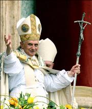 Pope Benedict XVI delivers his blessing at the end of the traditional "Urbi et Orbi&squot;&squot; speech, Latin for "To the city and to the world&squot;&squot;, from the terrace of St. Peter&squot;s Basilica, Vatican, Sunday, April 16, 2006. Pope Benedict XVI, celebrating his first Easter as pontiff as well as his 79th birthday, led tens of thousands of faithful in Mass.
