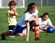 KSA Fury player Taylor Akagi stretches before a practice Thursday afternoon. The Fury plays various teams from around the Kansas City and Topeka area. The is the Fury's secon season after finishing in first place in the fall season.