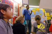 Jamaal James, 17, of Trinidad, talks to fourth-graders at Broken Arrow School in this file photo. Broken Arrow received the Governor's Achievement Award because of its excellent academic standings.